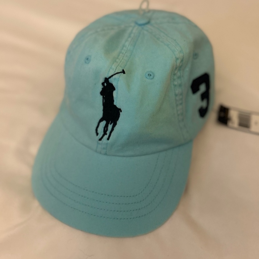 Brand new with tags! Ralph Lauren Polo Hat. Aqua color..